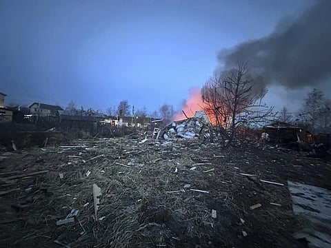 This photo released by Moscow Region Governor Andrei Vorobyev official telegram channel shows the site where one of the shot down Ukrainian drones fell, outside Moscow, Russia, on Tuesday, March 11, 2025. 