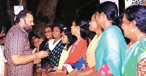 Union minister Suresh Gopi interacts with ASHA workers who are on an indefinite strike in front of the Secretariat in Thiruvananthapuram on Tuesday
