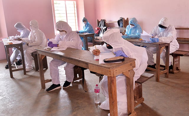 Covid-19 students writing an SSLC exam at St Mary’s HSS, Pattom, in Thiruvananthapuram