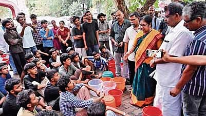 Minister R Bindu speaking to the students of Government Fine Arts College who staged a surprise protest against the water shortage in the college and hostel while she was in the college to inaugurate its golden jubilee celebrations 
