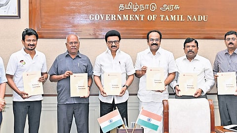 Chief Minister MK Stalin unveiling the Economic Survey in the presence of ministers Udhayanidi Stalin and Thangam Thennarasu, and officials on Thursday 