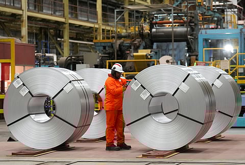 A steel worker works at the ArcelorMittal Dofasco steel plant in Hamilton, Ont., on Wednesday, March 12, 2025.