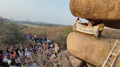 Students and staff of Hyderabad Central University protest at the Kancha Gachibowli forest site opposing the Telangana government's decision to develop the 400-acre land parcel.