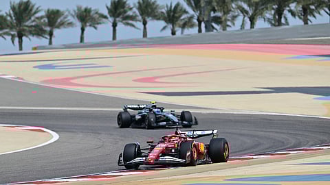 Ferrari's Monegasque driver Charles Leclerc and Mercedes' Italian driver Andrea Kimi Antonelli drive on the third day of the Formula One pre-season testing at the Bahrain International Circuit.