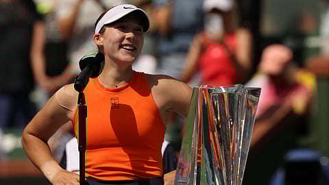 Russia's Mirra Andreeva speaks next to her trophy after defeating Belarus' Aryna Sabalenka during the women’s singles final tennis match at the BNP Paribas Open at the Indian Wells Tennis Garden on March 16, 2025.
