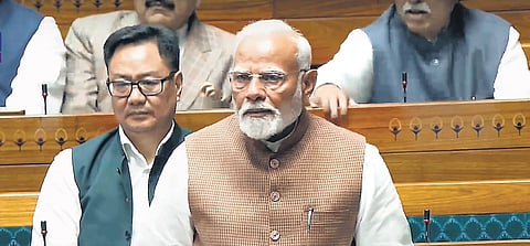 FILE | PM Narendra Modi speaks in the Lok Sabha during the Budget session of Parliament.