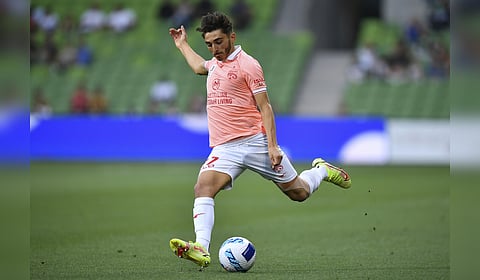 Josh Cavallo of Adelaide United plays during their A-League against Western United in Melbourne, Australia, Dec. 17, 2021.