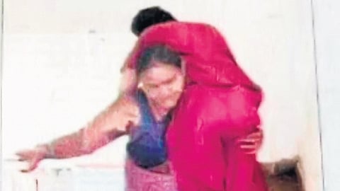 The student's mother was seen carrying the girl upstairs in a viral video.