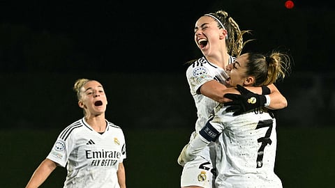 Real Madrid's Athenea del Castillo (C) celebrates scoring her team's second goal with defender #07 Olga Carmona during the UEFA Women's Champions League quarter final first leg football match between Real Madrid CF and Arsenal on March 18, 2025. 
