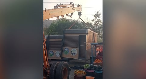 Authorities remove pre-fabricated shops in Nalgonda on Tuesday