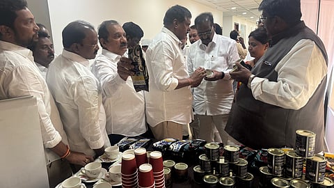 Ministers gather around the stall set up within Assembly premises on Tuesday.