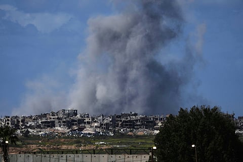Smoke rises following an Israeli bombardment in the Gaza Strip, as seen from southern Israel on Wednesday, March 19, 2025.