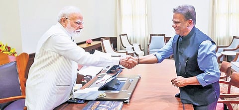 Dilip Ray greeting Prime Minister Modi at New Delhi on Thursday, March 20, 2025.