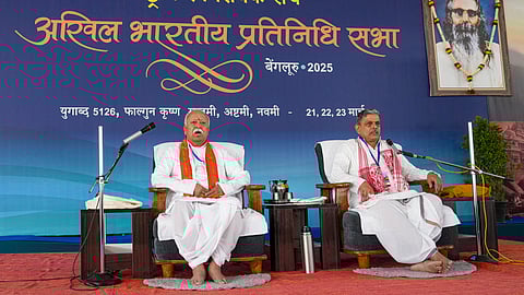 Rashtriya Swayamsevak Sangh (RSS) Sarasanghachalak (Chief) Mohan Bhagwat with RSS Sarakaryavah (General Secretary) Dattatreya Hosabale during the annual meeting of Akhil Bharatiya Pratinidhi Sabha (ABPS), the highest body of decision-making and policy formulation of the RSS, in Bengaluru, Friday, March 21, 2025.