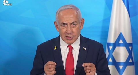 Mona al-Raqab cares for her son Osama, 5, which she says his cystic fibrosis has worsened since the start of the war due to the lack of meat, fish and enzyme tablets to help him digest food, at a malnutrition clinic in Nasser hospital, Khan Younis, Gaza Strip, Thursday, May 1, 2025.