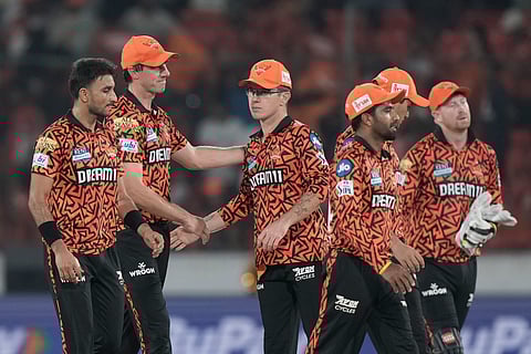 Sunrisers Hyderabad's captain Pat Cummins and teammates celebrate their win over Rajasthan Royals' in the Indian Premier League cricket match between Sunrisers Hyderabad and Rajasthan Royals in Hyderabad, Sunday, March 23, 2025. 