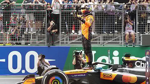 McLaren driver Oscar Piastri of Australia celebrates after winning the Chinese Formula One Grand Prix race at the Shanghai International Circuit, Shanghai, Sunday, March 23, 2025. 