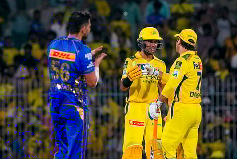 Chennai Super Kings' batters MS Dhoni and Rachin Ravindra after CSK won the IPL 2025 cricket match over Mumbai Indians, at MA Chidambaram Stadium in Chennai, Sunday, March 23, 2025.