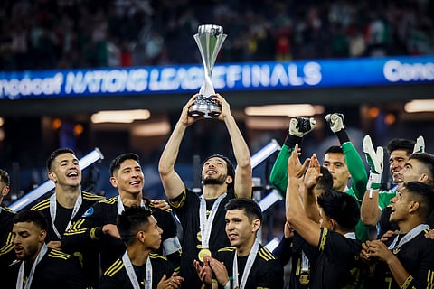 Mexico's Raul Jimenez lifts the trophy after the team won against Panama in a CONCACAF Nations League final soccer match Sunday, March 23, 2025, in Inglewood, Calif.