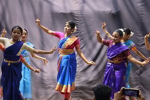 Dancers gracefully perform at the Basanta Utsav event