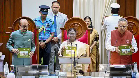 In this image provided by President House, President Droupadi Murmu with Chhattisgarh Governor Ramen Deka and Assembly Speaker Raman Singh during the silver jubilee function of the state Assembly, in Raipur.