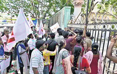 SFI cadre staging a 
protest at the college 
on Tuesday 