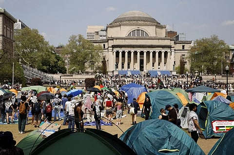 Student protesters gather inside their encampment on the Columbia University campus, April 29, 2024, in New York.
