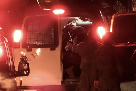 Hamdan Ballal, Palestinian co-director of Oscar-winning documentary "No Other Land," is detained by the Israeli military from his home in the Israeli-occupied West Bank, Monday, March 24, 2025.