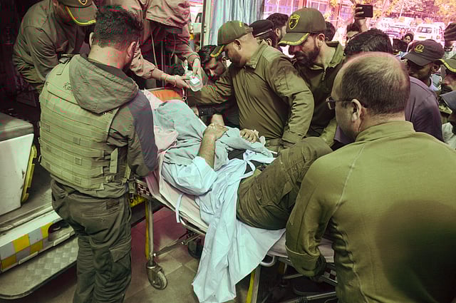 A police personnel, injured in the Kathua encounter, being shifted to Govt Medical College Hospital, in Jammu Thursday, March 27, 2025. 