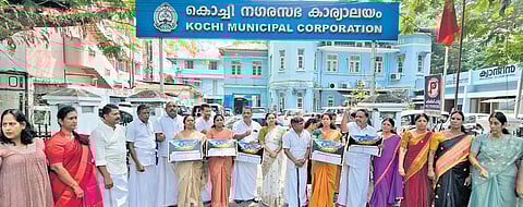 UDF councillors stage protest in front of the Kochi corporation office on Thursday after they walked out of the budget discussion