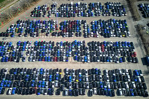Opel cars are parked on the ground of the Opel car factory in Ruesselsheim near Frankfurt, Germany, Thursday, March 27, 2025.