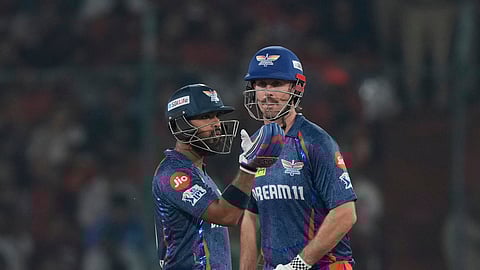 Lucknow Super Giants' Nicholas Pooran, left, celebrates after scoring fifty runs during the Indian Premier League cricket match between Sunrisers Hyderabad and Lucknow Super Giants at Rajiv Gandhi International Cricket Stadium in Hyderabad, India, Thursday, March 27, 2025.