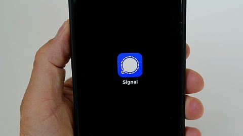 An image of the Signal app is shown on a mobile phone in San Francisco, March 18, 2025.