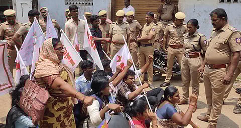 Members of SFI staged a protest in front of the private Matriculation School in Subramaniyapuram area on Thursday, demanding action against the school management who engaged the male tailors for measuring the girl students' body measurements for stitching uniforms for the upcoming academic year.