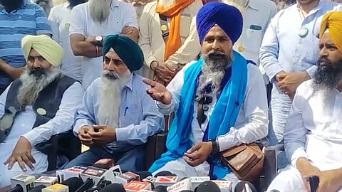 Farmer leader Sarwan SIngh Pandher holding a press conference after he was released from jail.