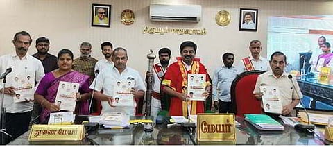 Mayor N Dinesh Kumar presented the budget for the Tiruppur Corporation at a special meeting of the council on Friday.