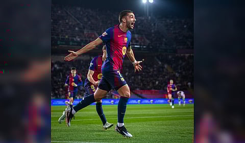 Barcelona's Ferran Torres celebrates after scoring the first goal during the Spanish league football match between FC Barcelona and CA Osasuna on March 27, 2025.