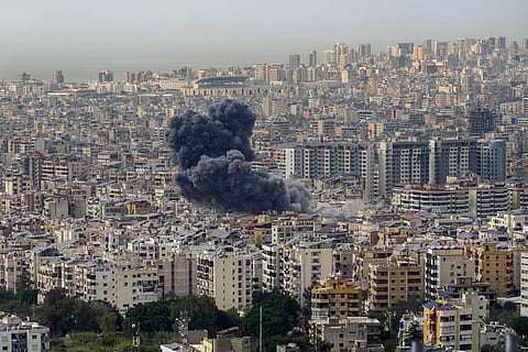 Smoke rises following an Israeli airstrike on Dahiyeh, in the southern suburb of Beirut, Lebanon, Friday, March 28, 2025.