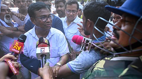 OPCC president Bhakta Das being while marching towards assembly during a protest rally demanding for a House Committee formation to address growing crimes against women, in Bhubaneswar on Thursday.
