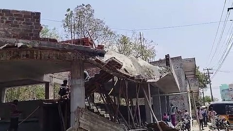 The collapsed roof of the under construction shelter. 