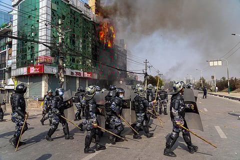 Police secure the site of a house set on fire by a pro-monarchist group during a protest in Kathmandu, Nepal, on Friday, March 28, 2025.