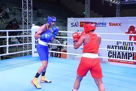 Jaismine Lamboria (L) in action during the women's national boxing championship in Greater Noida 