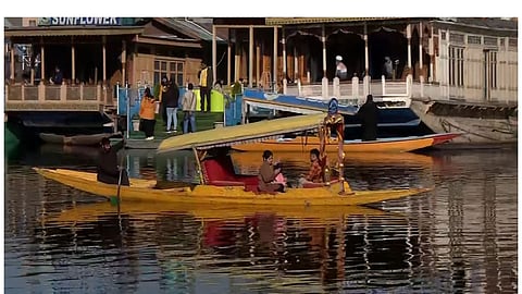 J-K: Early summer tourists enjoy chilly morning at Dal Lake in Srinagar