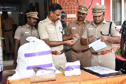 Cuddalore superintendent of police S Jeyakumar (second from left) inspecting the contraband seized during a raid near M Pudur TB hospital on Friday 