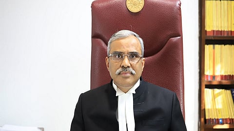 Justice Dinesh Kumar Sharma
