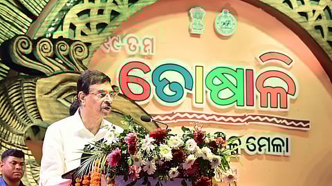 The Governor addressing the concluding ceremony of Toshali Mela on Monday.
