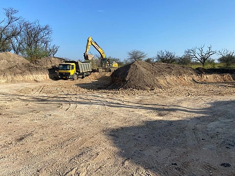 Gravel is taken from Chinnavedampatti Lake for the western Ring Road Bypass works.