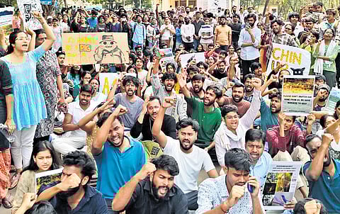 Students of the University of Hyderabad protest against the government’s decision to auction 400 acres of land.