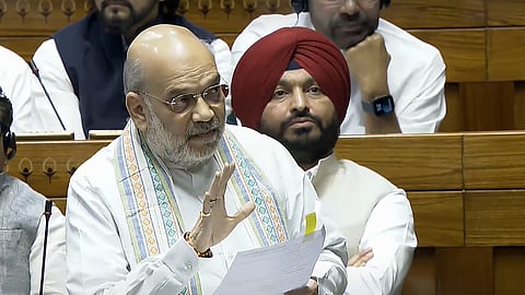 Union Home Minister Amit Shah speaks in the Lok Sabha during the Budget session of Parliament, in New Delhi, Wednesday, April 2, 2025.