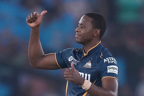 Gujarat Titans' Kagiso Rabada celebrates the dismissal of Punjab Kings' Prabhsimran Singh during an IPL match in Ahmedabad (Photo  | AP)